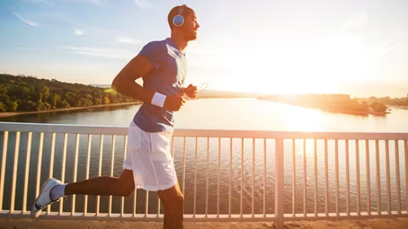 Man jogging with headphones on